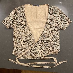 SOLD Brandy Melville Cheetah Rae Top